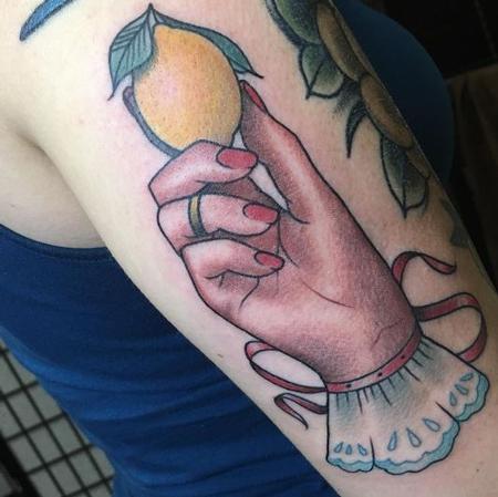 Sam Frederick - Hand Holding Lemon